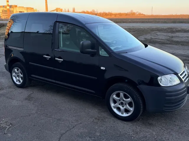 Volkswagen Caddy - фото 1