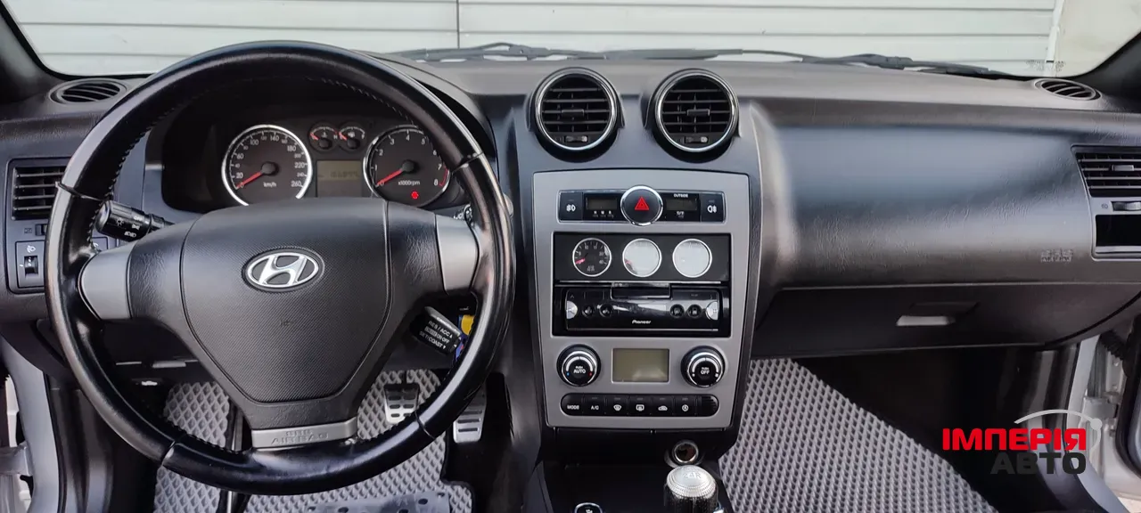 Hyundai Coupe - фото 8