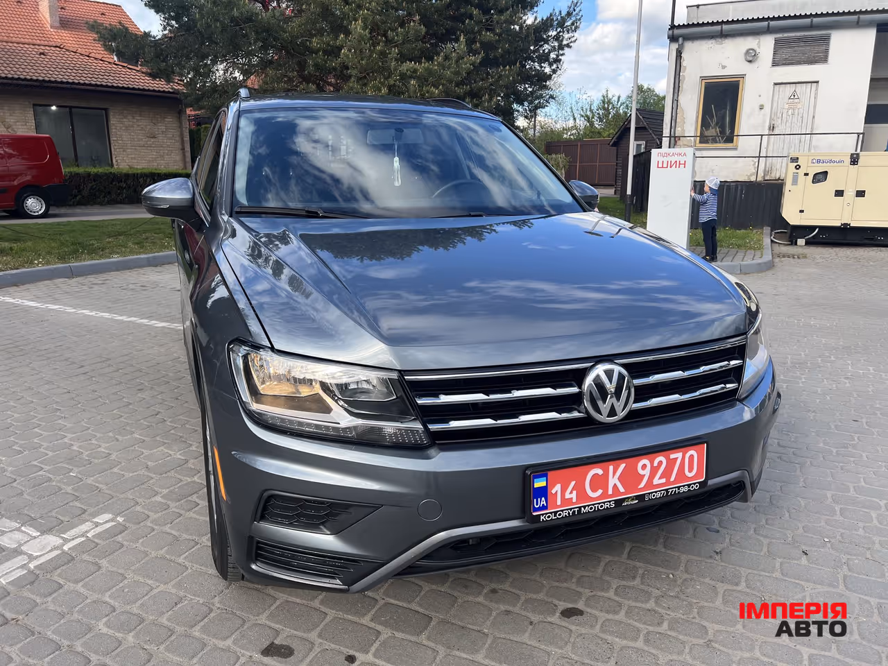 Volkswagen Tiguan - фото 2