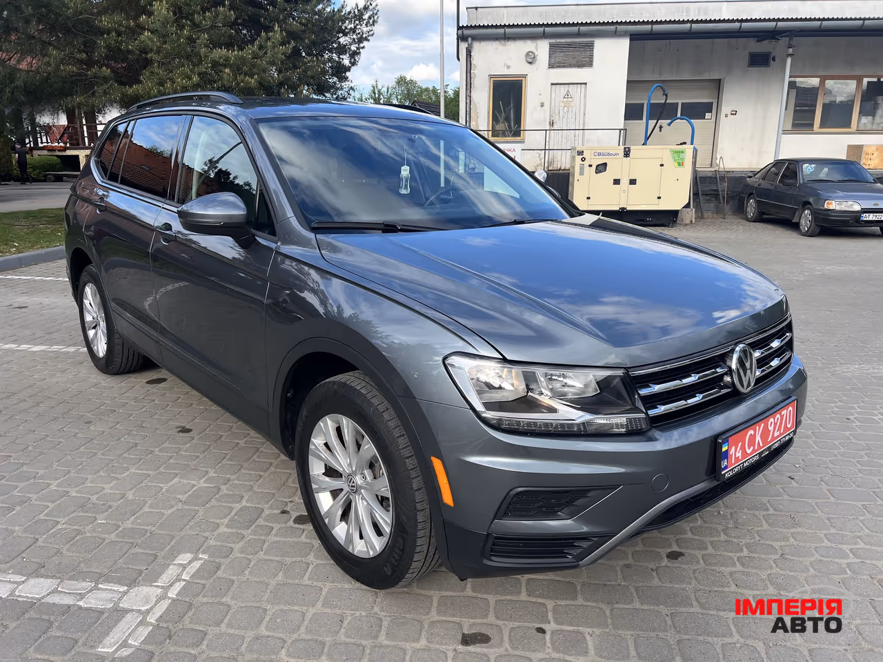 Volkswagen Tiguan - фото 4