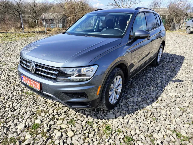 Volkswagen Tiguan - фото 1