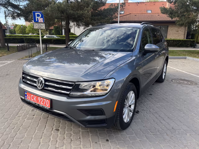 Volkswagen Tiguan - фото 1