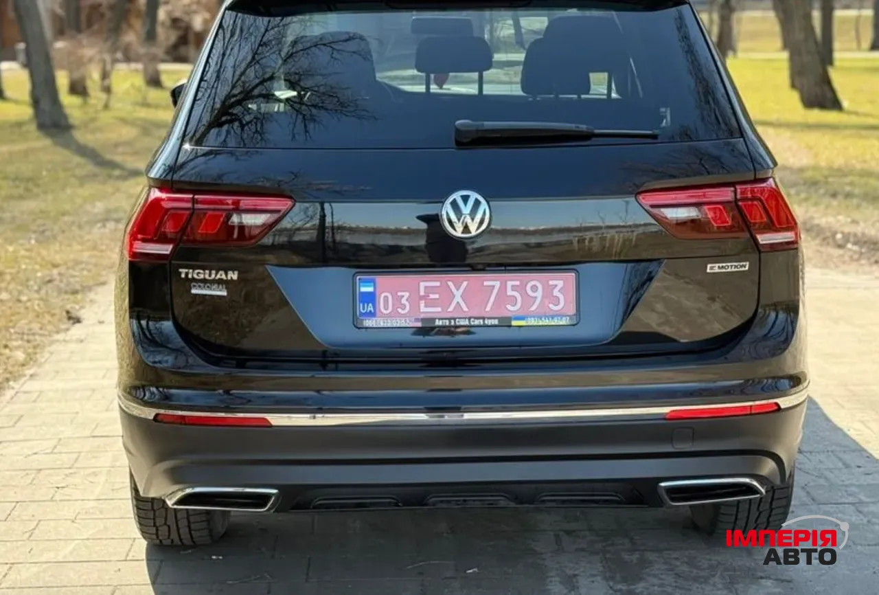 Volkswagen Tiguan - фото 13