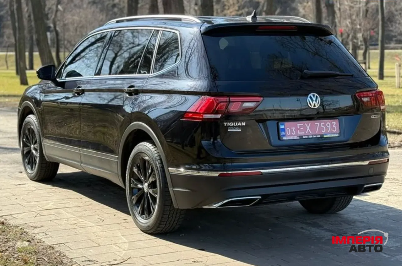 Volkswagen Tiguan - фото 4