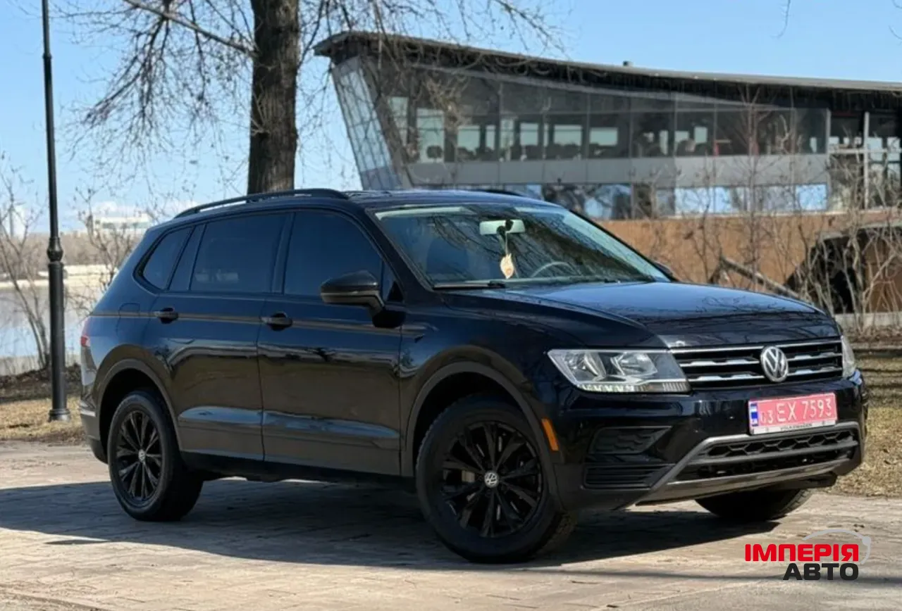 Volkswagen Tiguan - фото 10