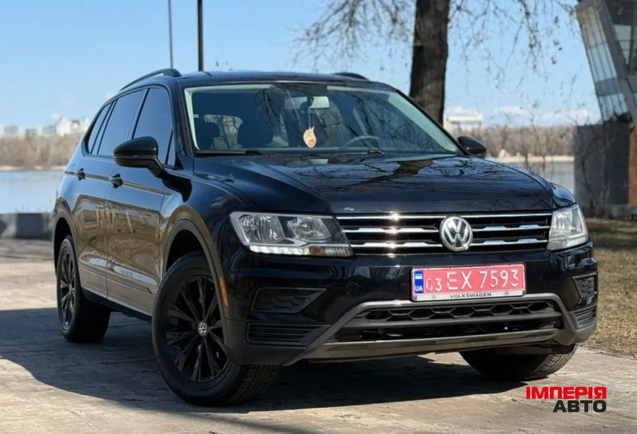 Volkswagen Tiguan - фото 1