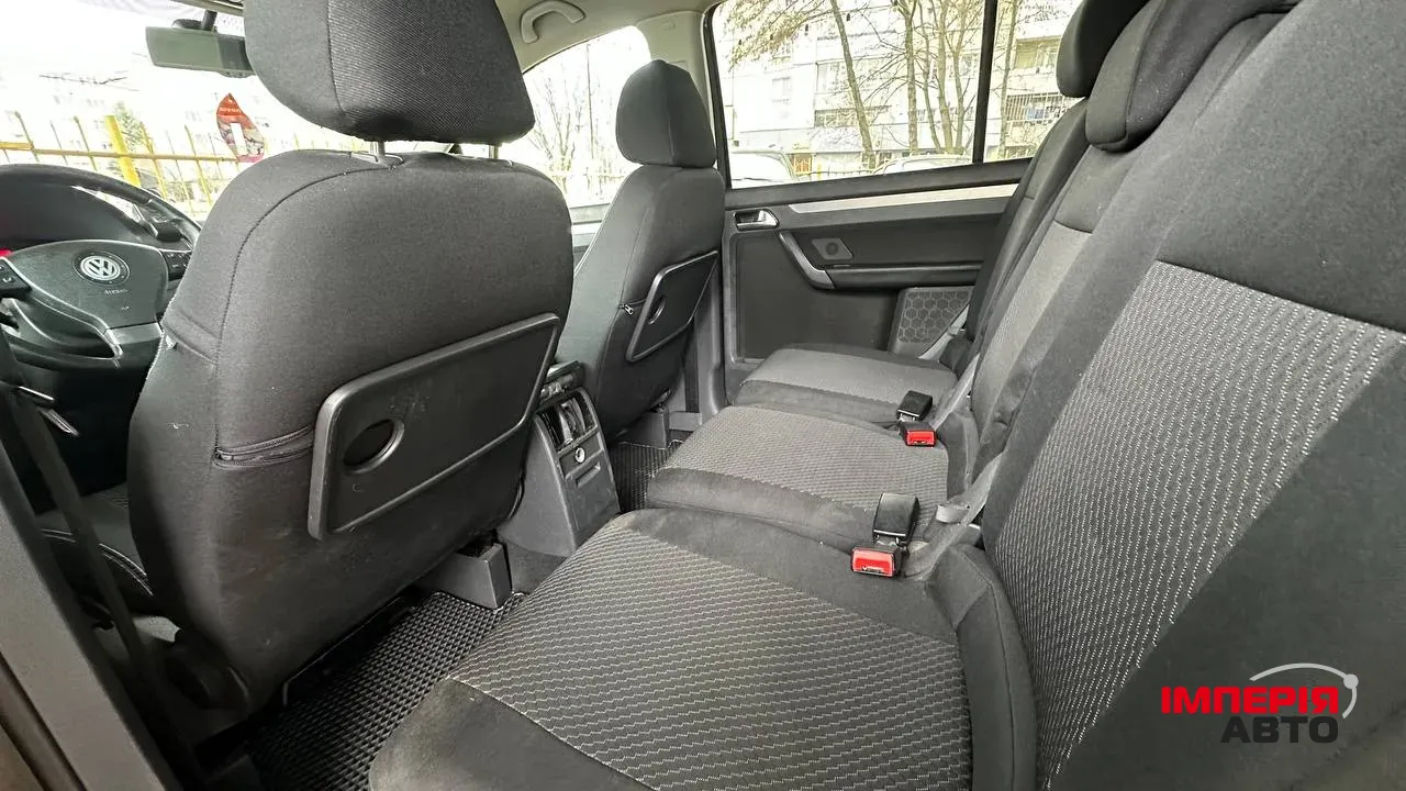 Volkswagen Touran - фото 7