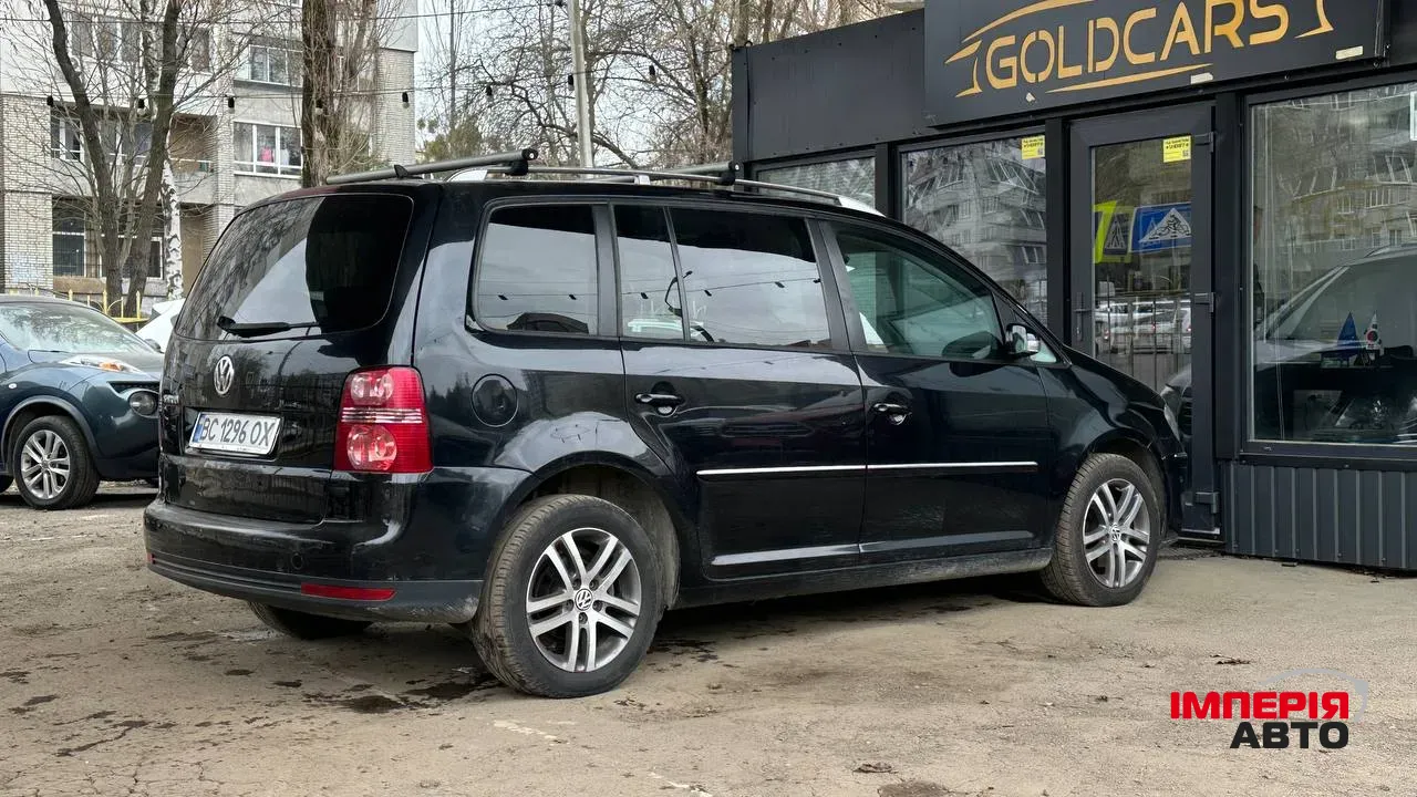 Volkswagen Touran - фото 8
