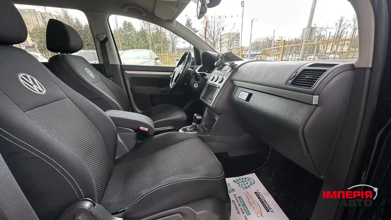 Volkswagen Touran - фото 3