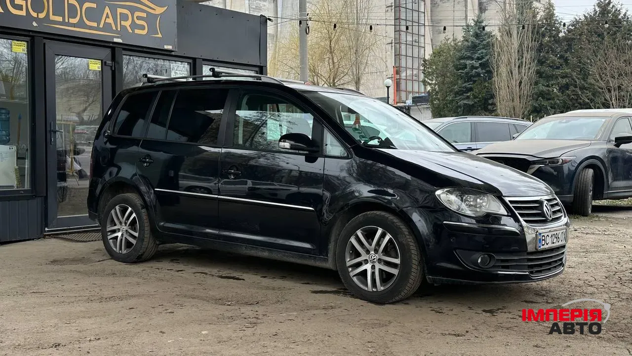 Volkswagen Touran - фото 2