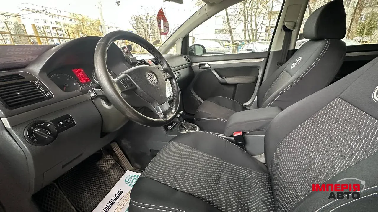 Volkswagen Touran - фото 6