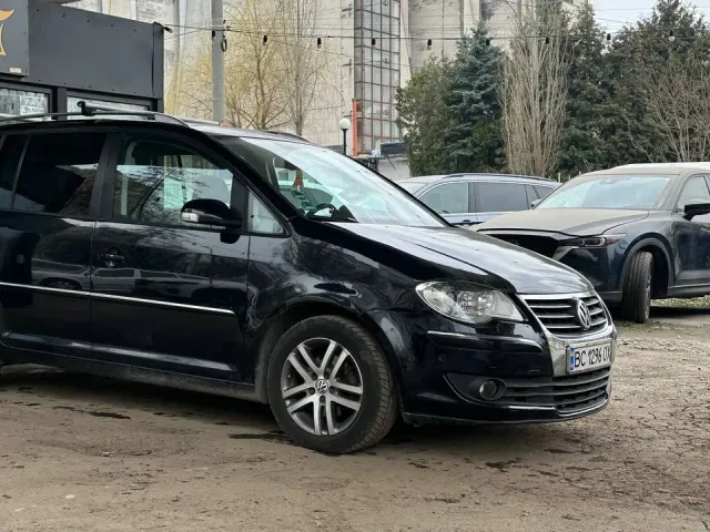 Volkswagen Touran - фото 2