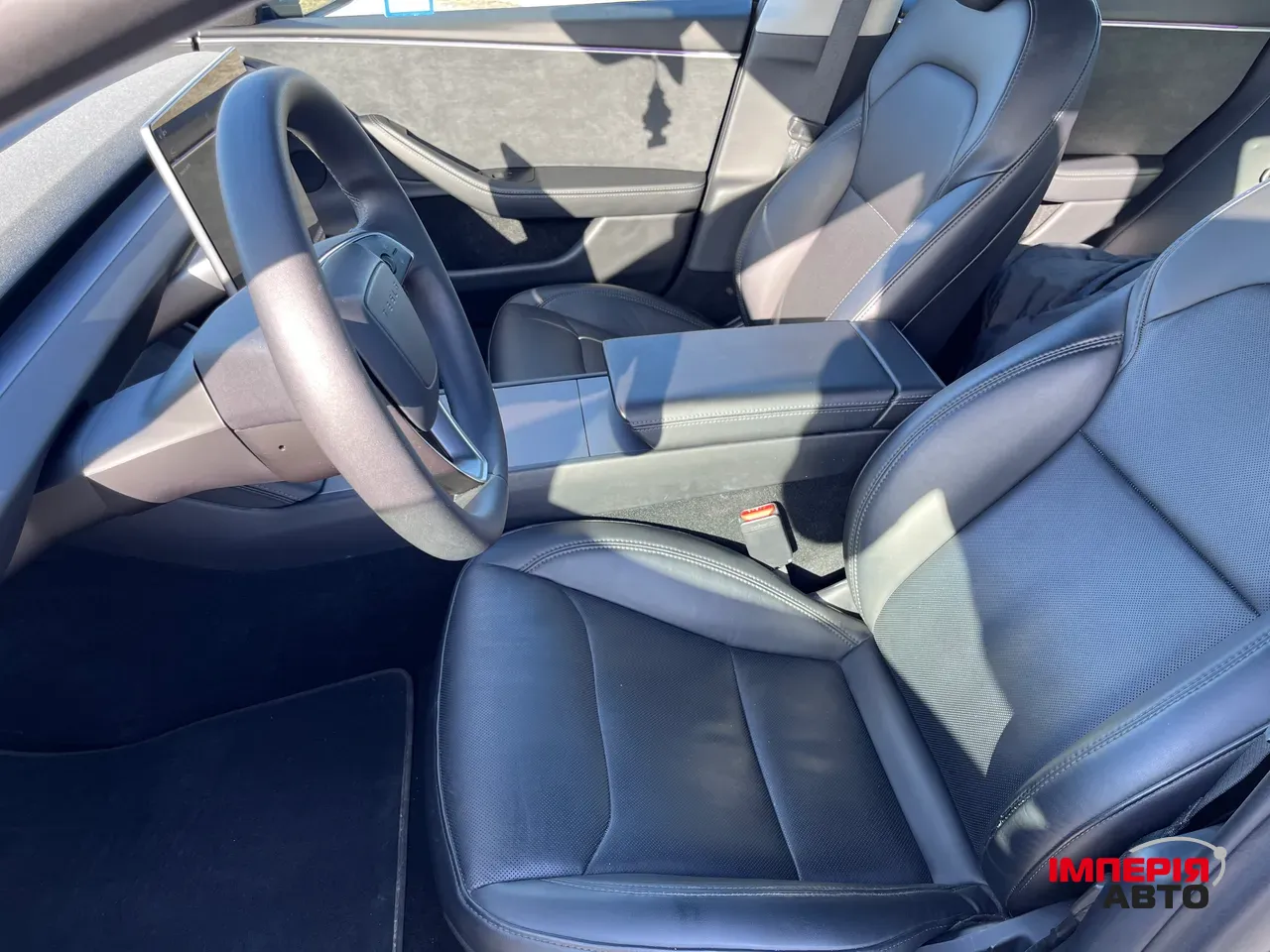 Tesla Model 3 - фото 12