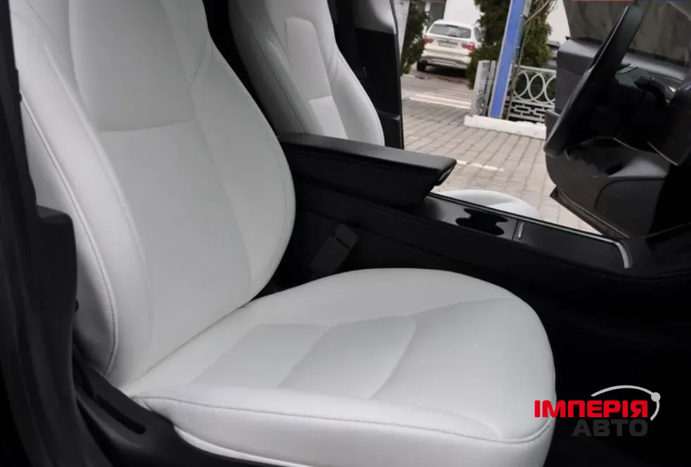 Tesla Model 3 - фото 7