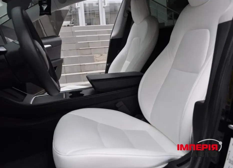 Tesla Model 3 - фото 8