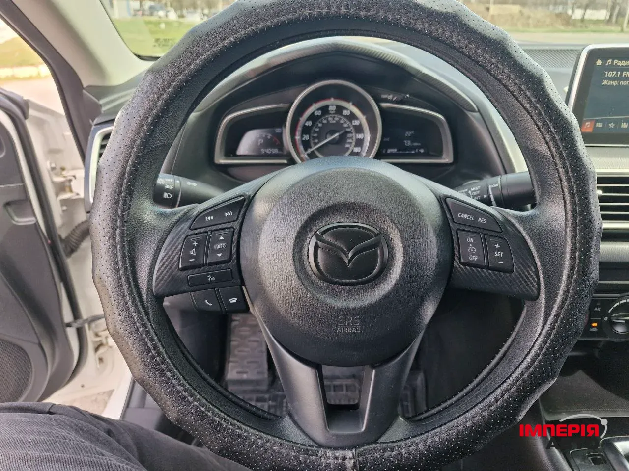 Mazda 3 - фото 16