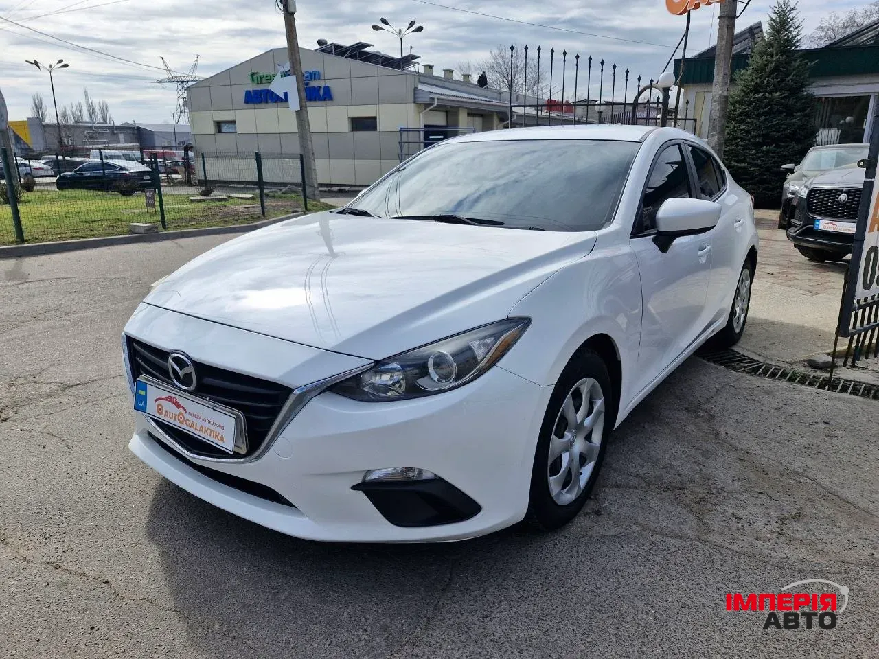 Mazda 3 - фото 2