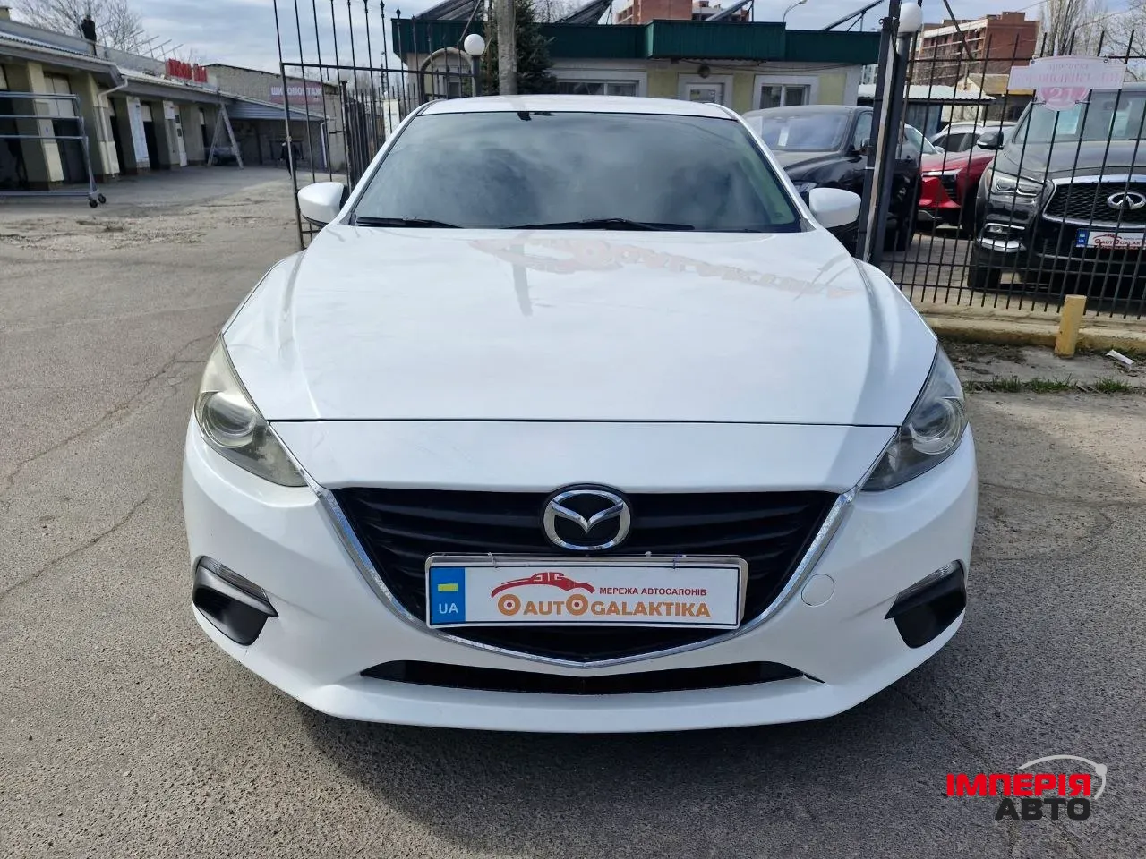 Mazda 3 - фото 4