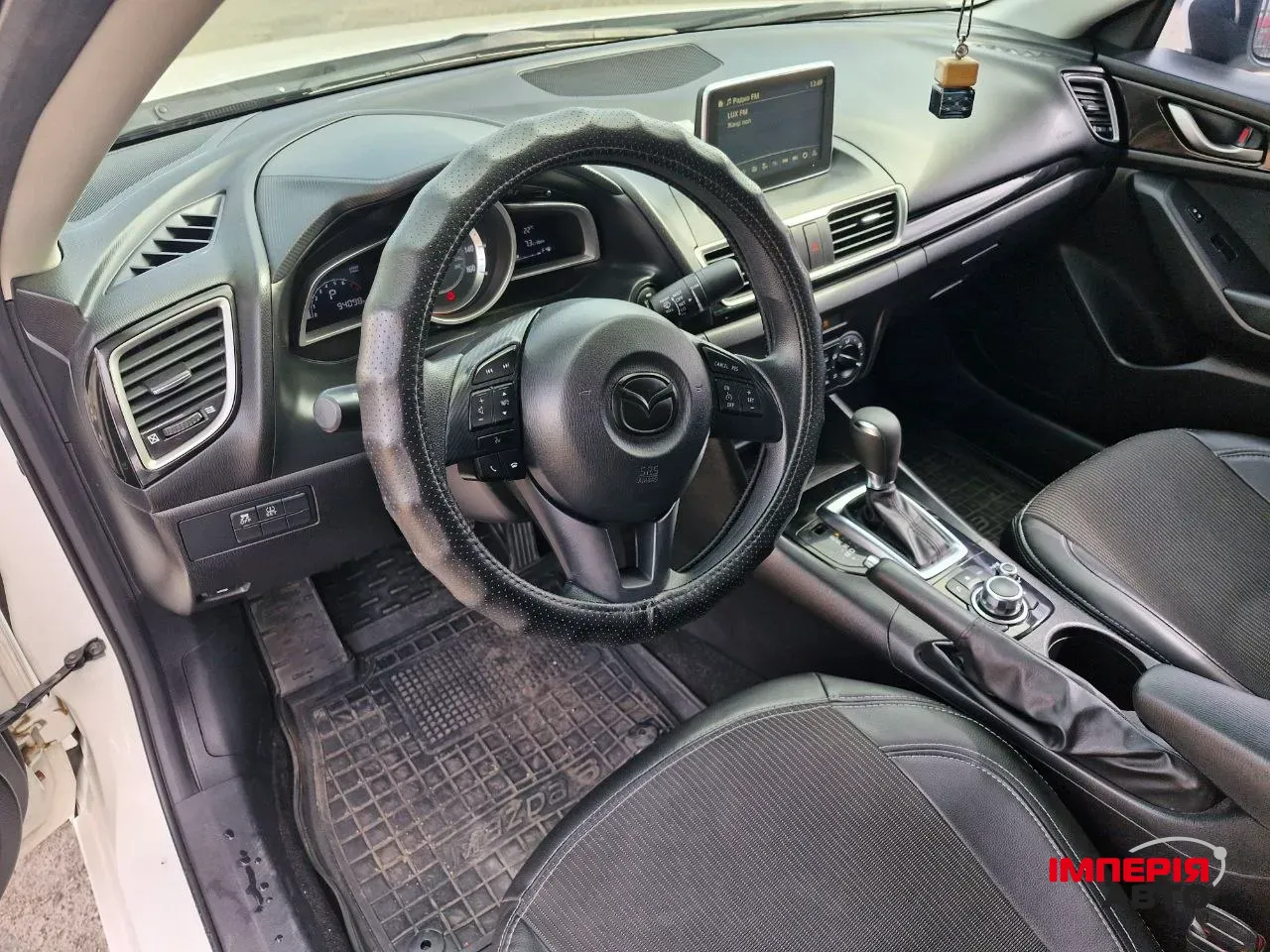 Mazda 3 - фото 11