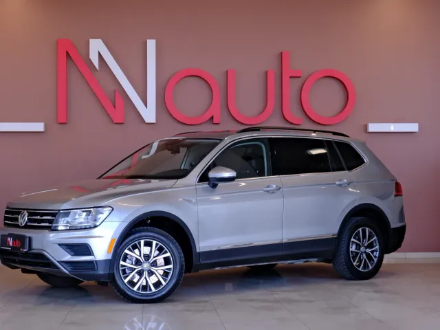 Volkswagen Tiguan - фото 1