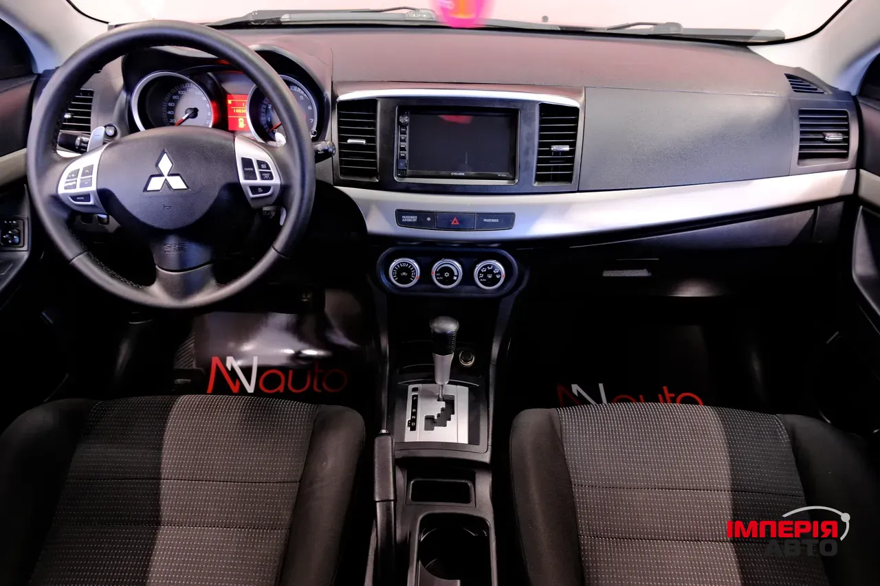 Mitsubishi Lancer - фото 7