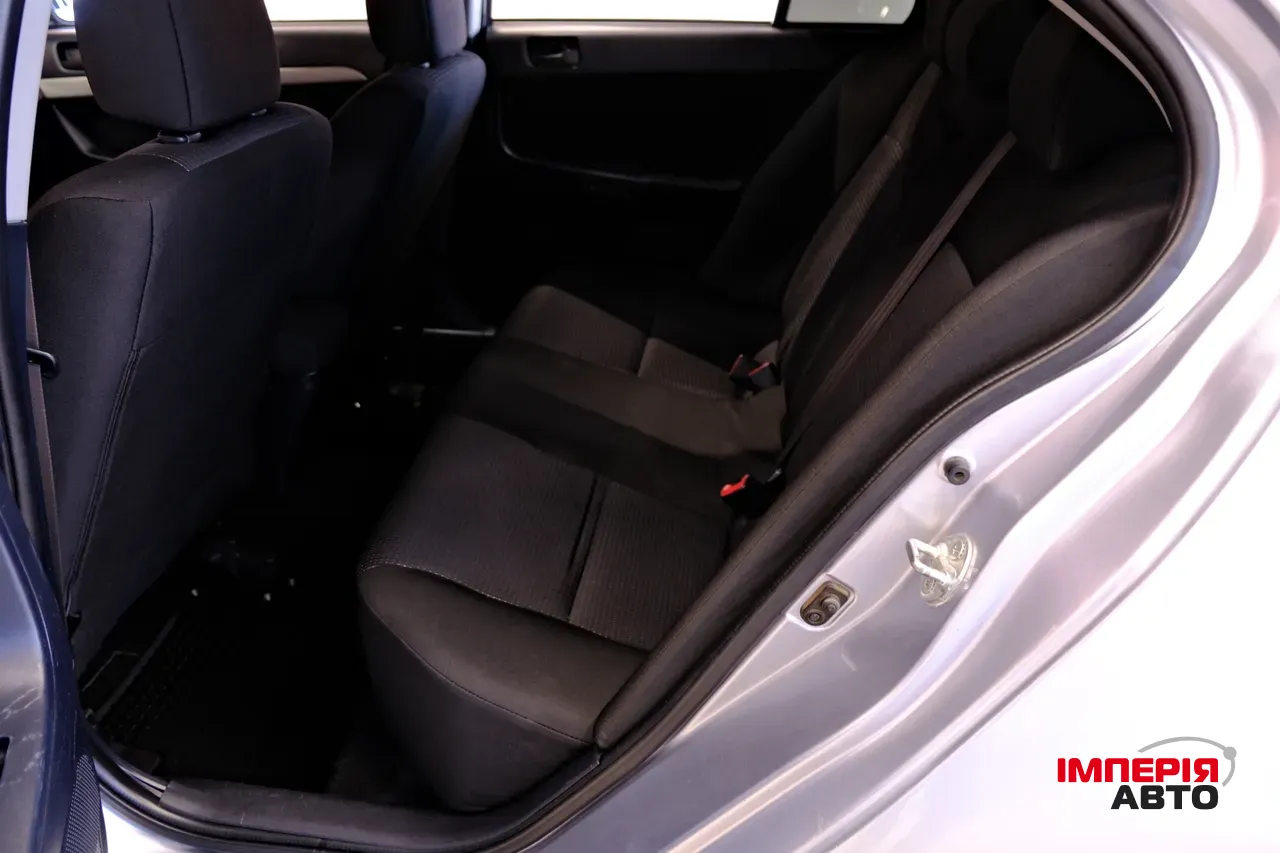 Mitsubishi Lancer - фото 8