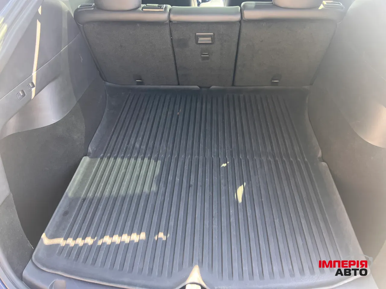 Tesla Model Y - фото 11