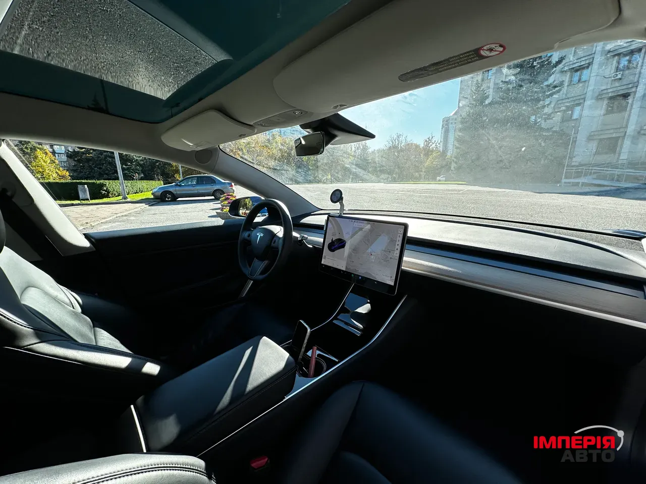 Tesla Model 3 - фото 9