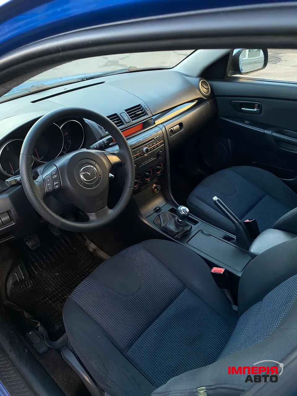 Mazda 3 - фото 14