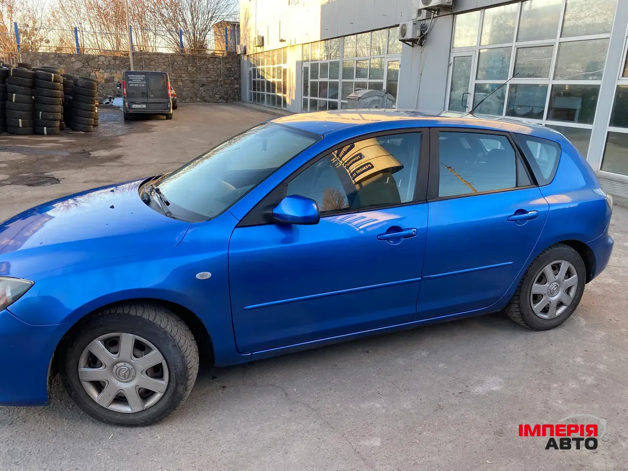 Mazda 3 - фото 8