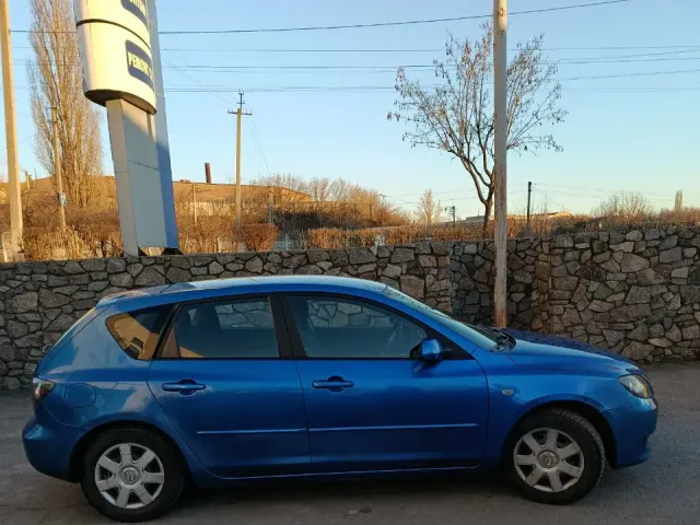 Mazda 3 - фото 4