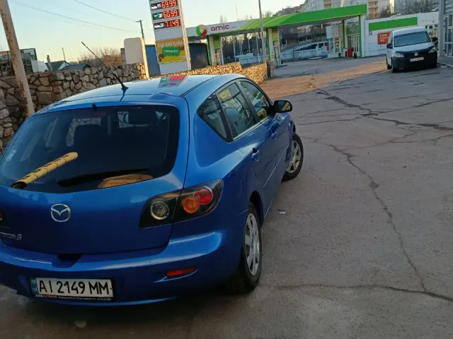 Mazda 3 - фото 5