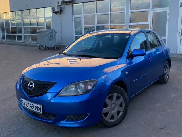 Mazda 3 - фото 1