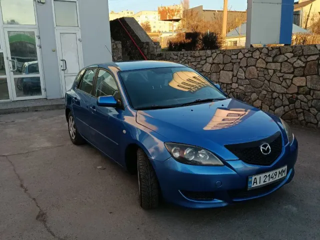 Mazda 3 - фото 3
