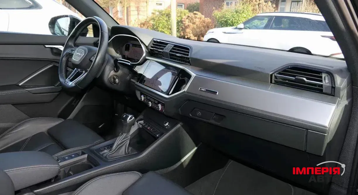Audi Q3 - фото 6