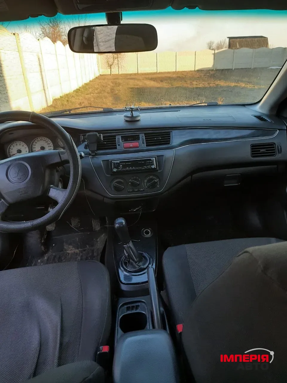 Mitsubishi Lancer - фото 7