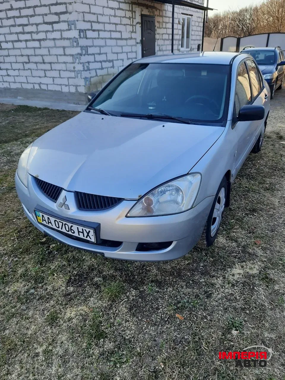 Mitsubishi Lancer - фото 1