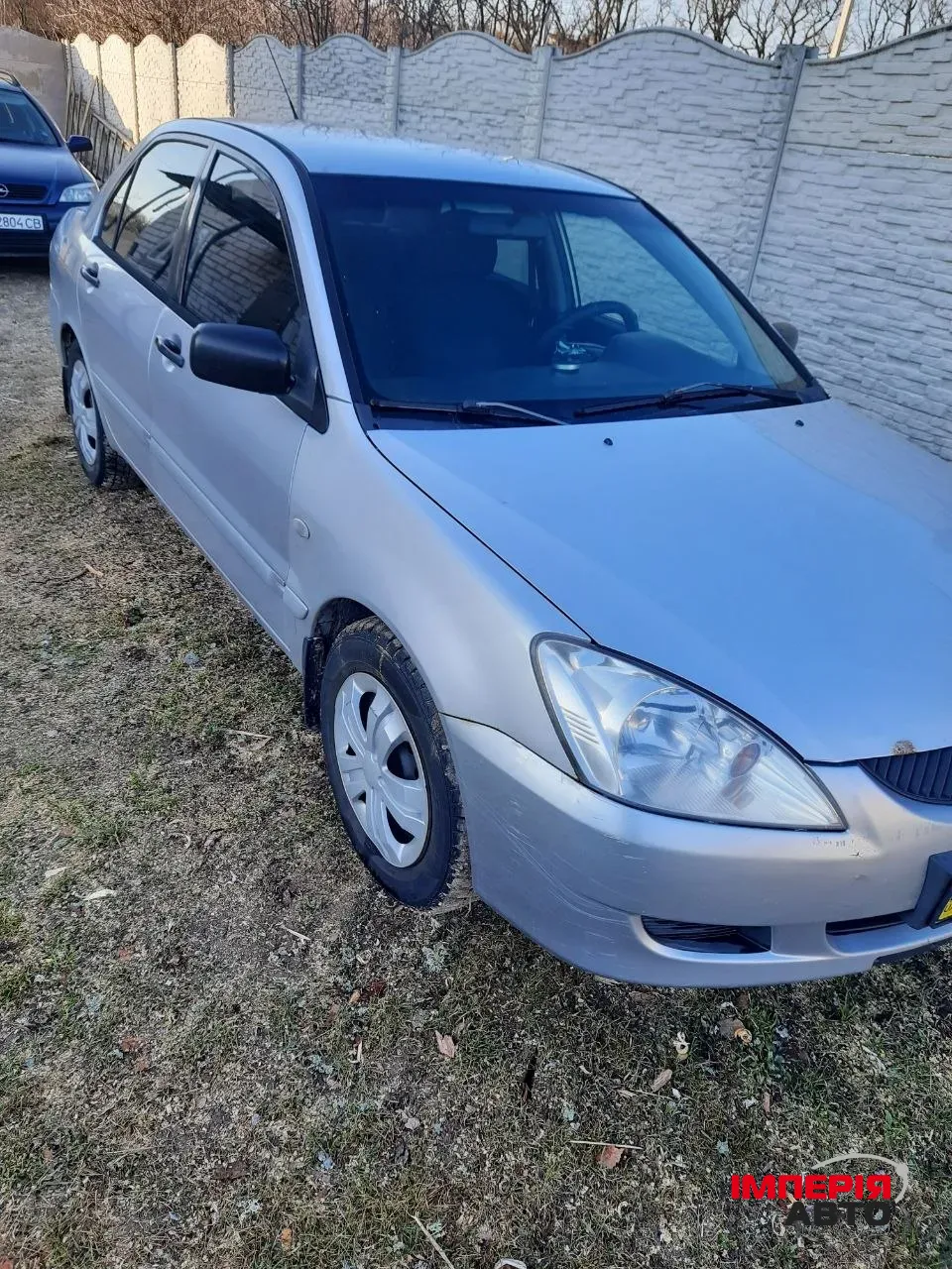 Mitsubishi Lancer - фото 4