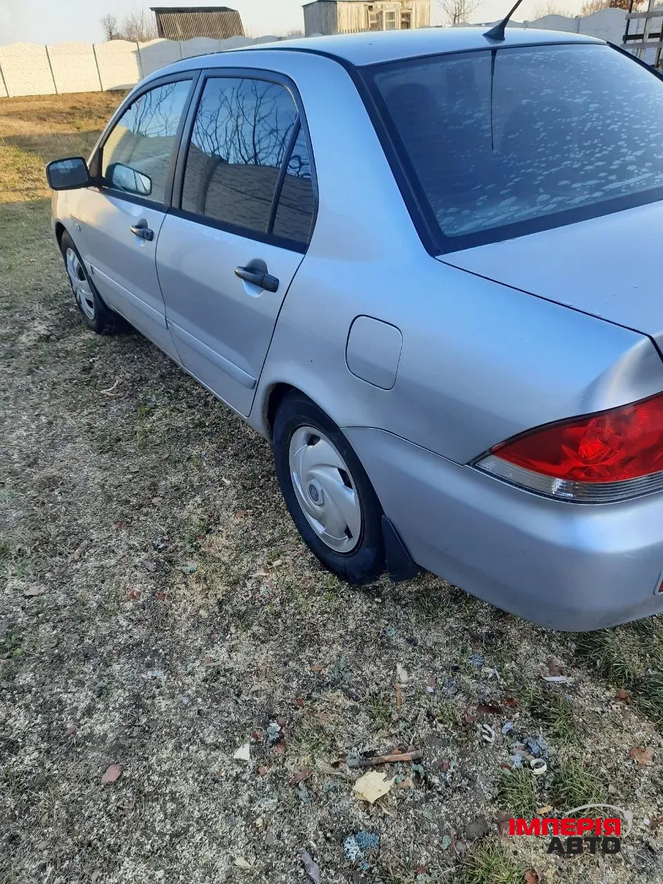 Mitsubishi Lancer - фото 5