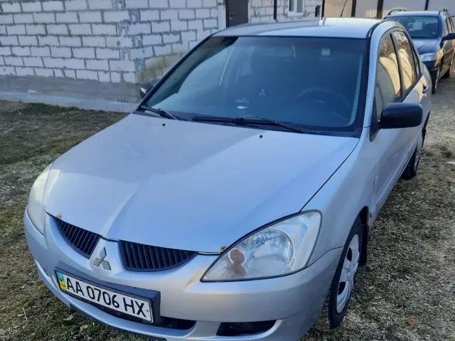 Mitsubishi Lancer - фото 1