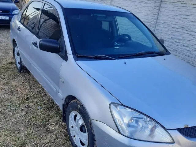 Mitsubishi Lancer - фото 4