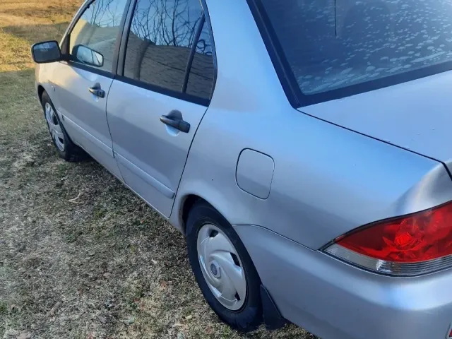 Mitsubishi Lancer - фото 5