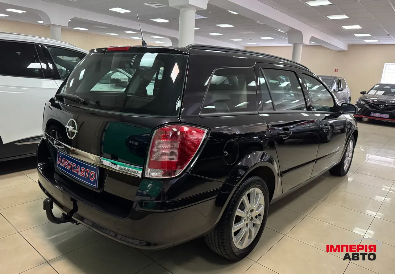 Opel Astra - фото 6