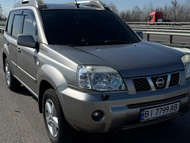 Nissan X-Trail - фото 1