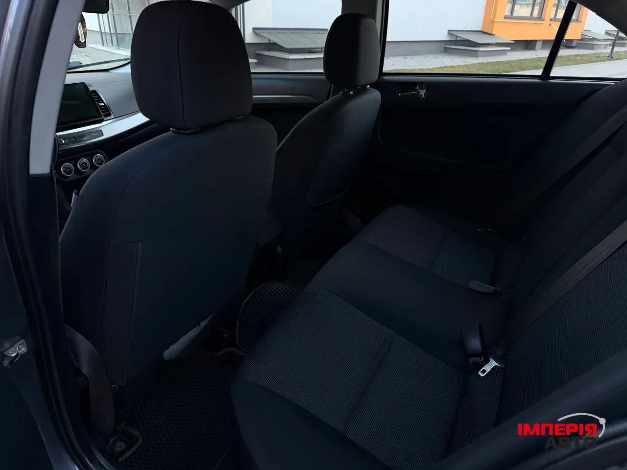 Mitsubishi Lancer - фото 6