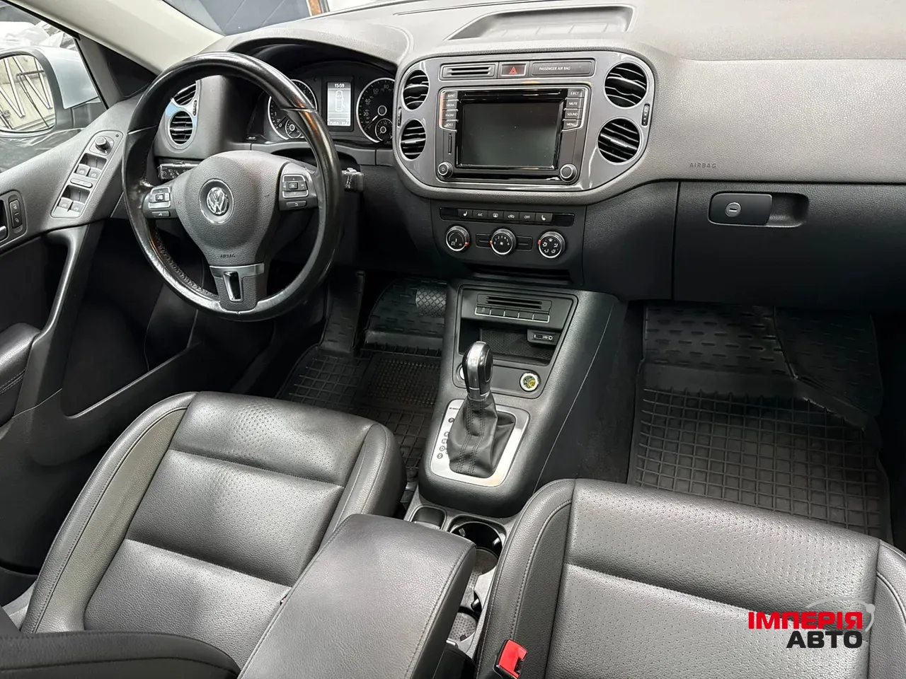 Volkswagen Tiguan - фото 6