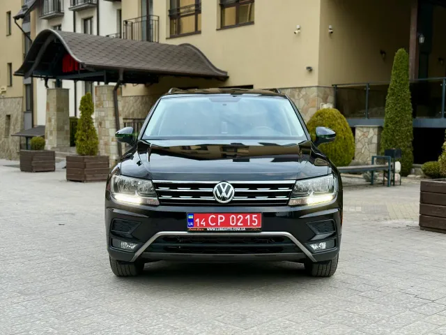 Volkswagen Tiguan - фото 1