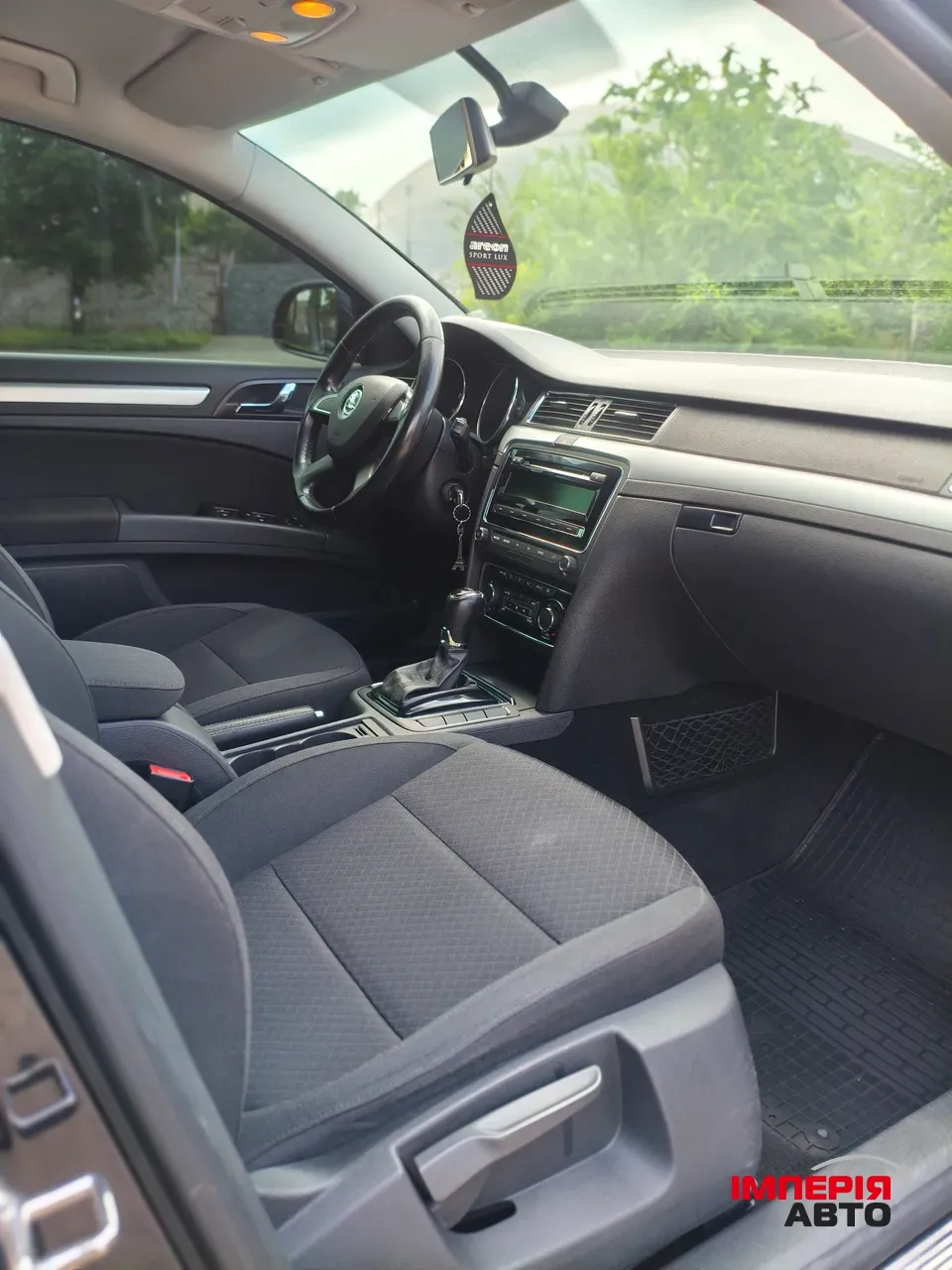 Skoda Superb - фото 12