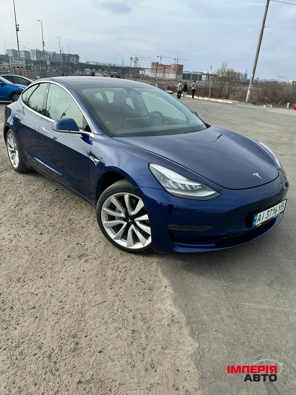 Tesla Model 3 - фото 1