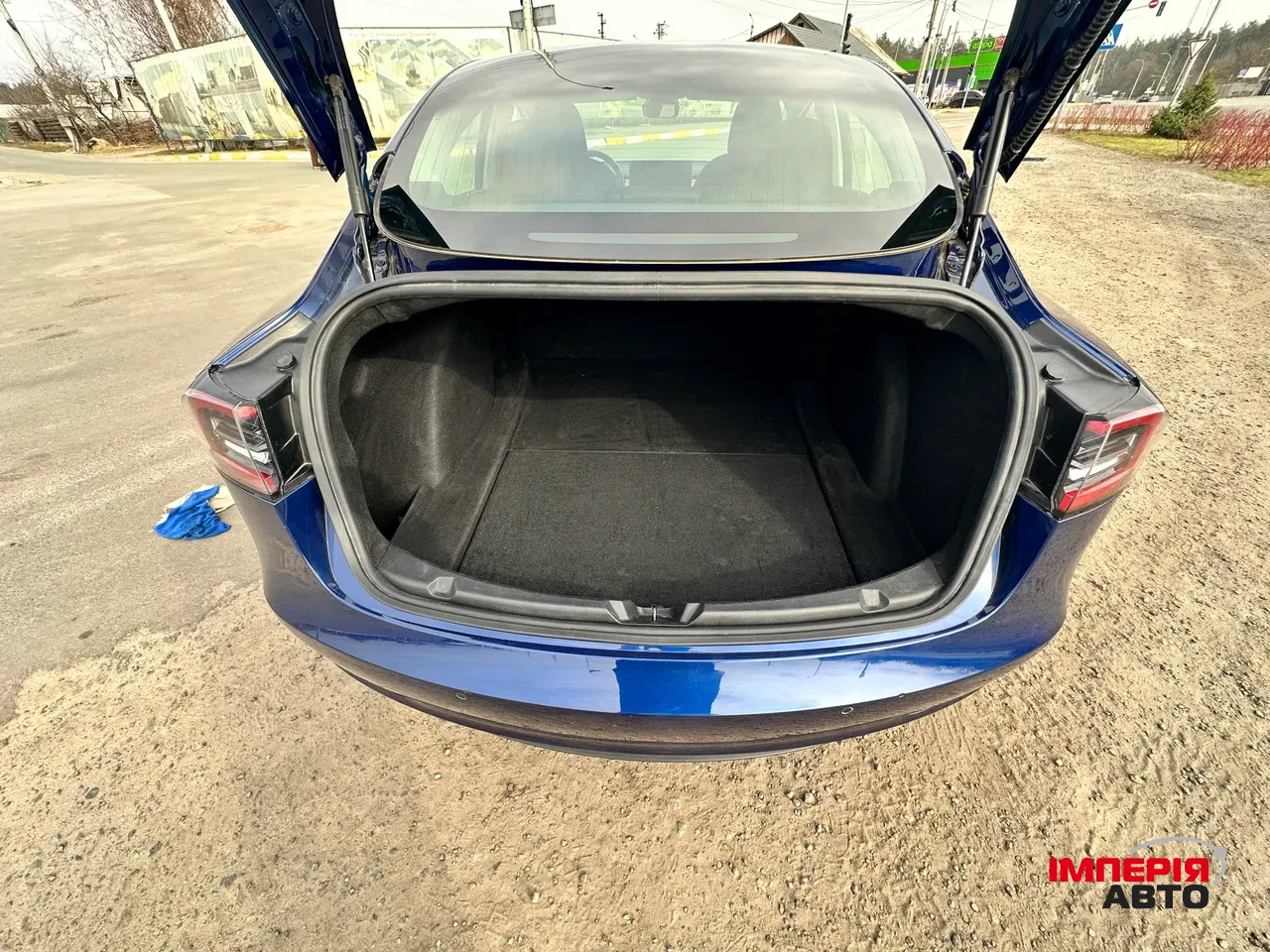 Tesla Model 3 - фото 12